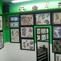 Photo taken at Emerald City Tattoo &amp; Supply by Mike D. on 8/23/2011