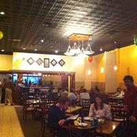 Photo taken at Cumin Indian Restaurant by J H. on 4/1/2011