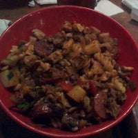 Photo taken at Genghis Grill by JEAN CARLOS on 10/24/2011
