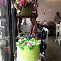 Photo taken at Ms. Dahlia&#39;s Cafe by Okema M. on 4/20/2012