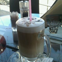 Photo taken at World Coffee by Александра А. on 4/9/2012