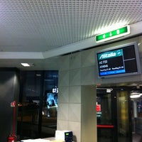 Photo taken at Gate A26 by Pieter D. on 5/15/2012