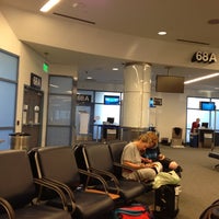 Photo taken at Gate 68A by Mike G. on 4/17/2012
