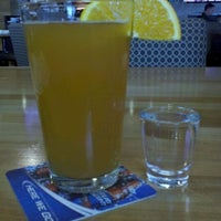 Photo taken at Sliders Bar &amp;amp; Grill by Tiffany B. on 3/24/2012