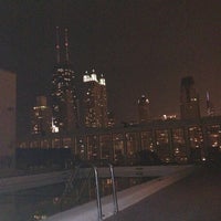 Photo taken at 1 E Scott Roof Top Pool Deck by Sami A. on 7/16/2012