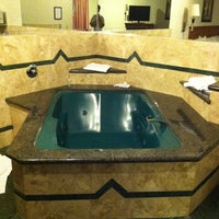 Photo taken at Sunburst Spa And Suites by Jose N. on 6/21/2012