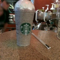Photo taken at Starbucks by Jenna A. on 5/12/2012