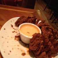 Photo taken at Outback Steakhouse by Tiffani M. on 5/15/2012