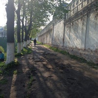 Photo taken at Дорожка вдоль стен мужского монастыря by Роман О. on 5/11/2014