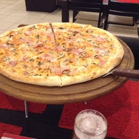 Photo taken at Tesoro Pizza by Olga P. on 3/12/2014
