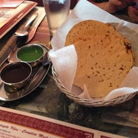 Photo taken at Mantra Indian Restaurant by Blake W. on 6/1/2013