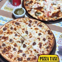 Photo taken at Pizza Taxi by Pizza Taxi on 10/6/2018