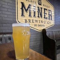 Photo taken at Miner Brewing Company by Timothy C. on 3/27/2022