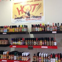Photo taken at HEAT Hot Sauce Shop by Roopak K. on 9/14/2013