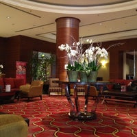 Photo taken at Marriott Hotel Asia by Erkan U. on 5/4/2013