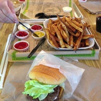 Photo taken at BurgerFi by Jasmin K. on 6/2/2013