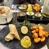 Photo taken at Madaen Hookah Lounge and Restaurant by Mina M. on 1/23/2021