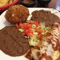Photo taken at Los Cucos Mexican Cafe by Christopher C. on 7/5/2014