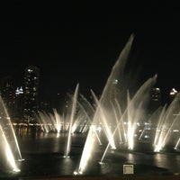 Photo taken at The Dubai Fountain by Ozan T. on 5/12/2013