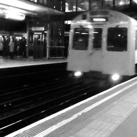 Photo taken at Platform 1 (E&amp;#39;bound District) by Alan F. on 11/22/2013