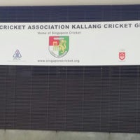 Photo taken at Kallang Cricket Field by Nik A. on 6/19/2014