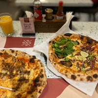 Photo taken at 8portions Pizza by Qoos . on 4/28/2024