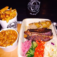 Photo taken at Mighty Quinn&amp;#39;s BBQ by Brandon C. on 4/20/2015