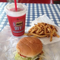 Photo taken at Mighty Fine Burgers by Juan G. on 4/24/2013