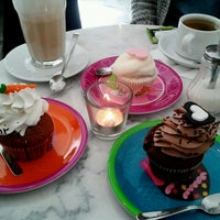 Photo taken at Lola&amp;#39;s cupcakes by Paula S. on 3/18/2013