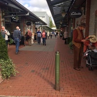 Photo taken at Clarks Village Outlet Shopping by Alan L. on 10/4/2018