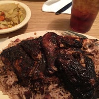 Photo taken at Uncle Desi Jamaican Grill by Nigel A. on 1/30/2015
