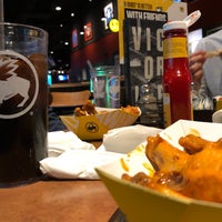 Photo taken at Buffalo Wild Wings by NA🔮 on 3/2/2019