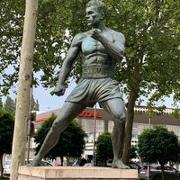 Photo taken at Statue de Jean-Claude Van Damme by Geoffrey B. on 8/9/2019