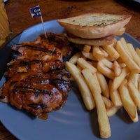 Photo taken at Nando&amp;#39;s by G on 9/30/2021