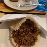 Photo taken at Arepas Cafe by Jessica L. on 9/28/2019