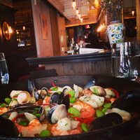 Photo taken at Socarrat Paella Bar by NYCRestaurant .. on 7/18/2014
