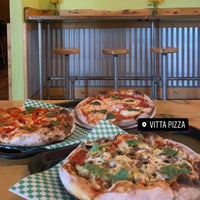 Photo taken at Vitta Pizza by Christie E. on 3/11/2022