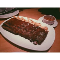 Photo taken at Outback Steakhouse by Bruno C. on 7/12/2015