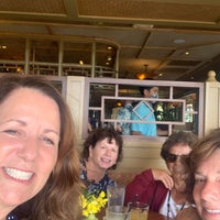 Photo taken at Tommy Bahama Tropical Café by Michelle M. on 8/23/2021