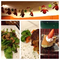 Photo taken at The Vines Seafood &amp;amp; Steak Restaurant by Yin L. on 12/31/2012