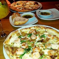 Photo taken at California Pizza Kitchen by Becca S. on 8/11/2013