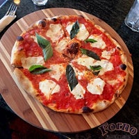 Photo taken at Forno Pizzeria &amp; Trattoria by Marco A. on 4/26/2014