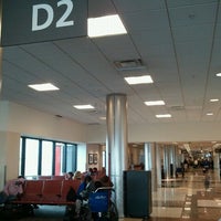 Photo taken at Gate D2 by Camille R. on 12/9/2012