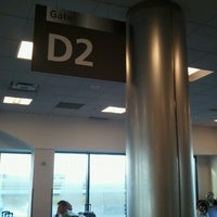 Photo taken at Gate D2 by Camille R. on 10/3/2012
