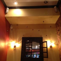 Photo taken at Taj Tribeca Restaurant &amp;amp; Bar by Humaid Alremeithi on 4/12/2013
