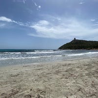 Photo taken at Spiaggia di Porto Giunco by rocco c. on 6/26/2022