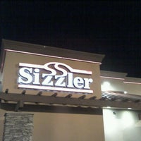 Photo taken at Sizzler by Troy N. on 1/10/2012