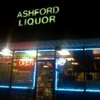 Photo taken at Ashford Liquor by Brittany W. on 4/4/2013