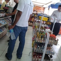 Photo taken at Posto Guaramirim (Pérola) by Ricardo Alexandre O. on 2/4/2014