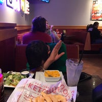 Photo taken at Red Robin Gourmet Burgers and Brews by Tiffany W. on 3/29/2017